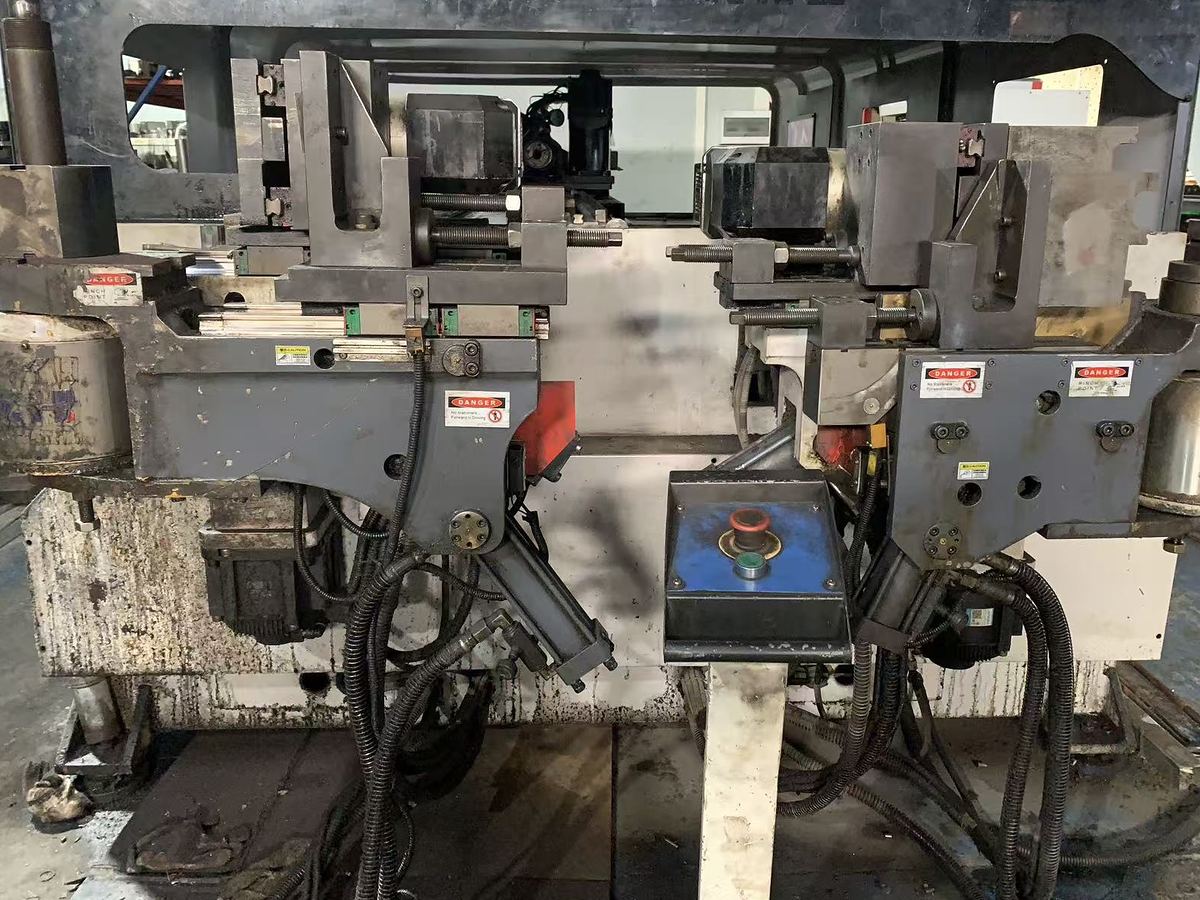 Dual-die push bending machine for large radius bends