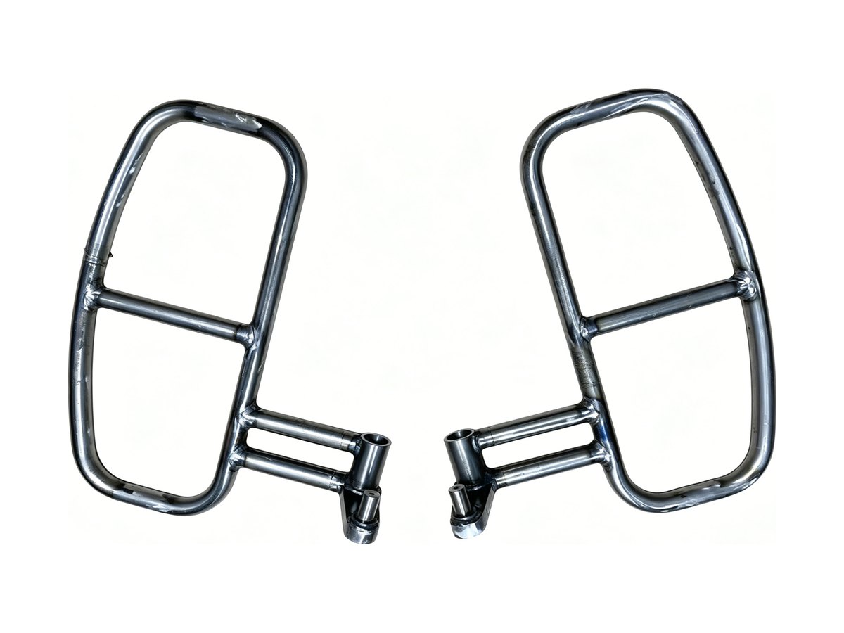 Pair of tubular motorcycle side footrest guards with welded cross bars